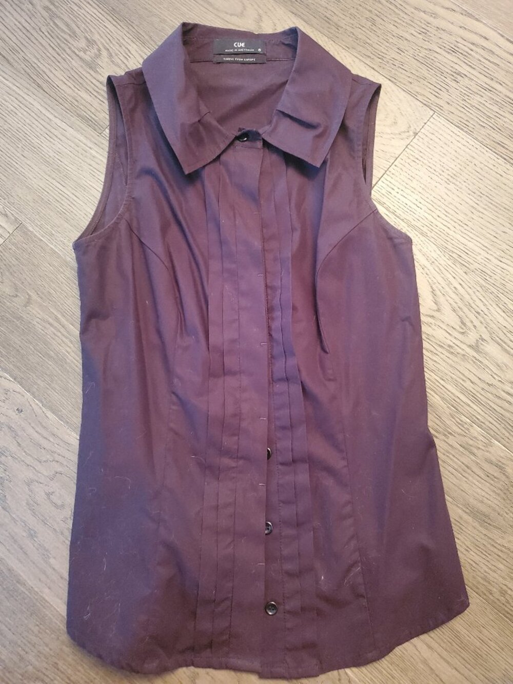 Purple sleeveless shirt (never worn)